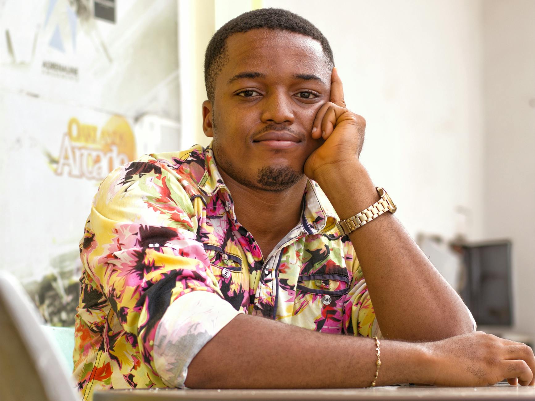 photo of man wearing floral shirt